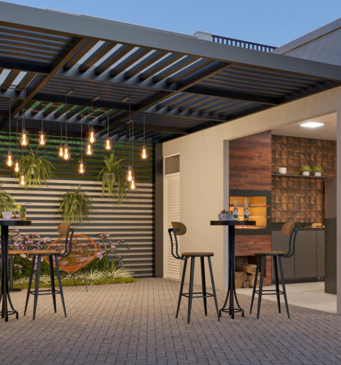 Área de lazer com espaços de convivência no Hey! Residence.